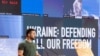 A Handout photograph taken on September 9, 2022 and released on September 10, 2022 by Yalta European Strategy (YES) press office, shows Ukrainian President Volodymyr Zelensky delivering an speech during the Yalta European Strategy forum in Kyiv. (Photo by