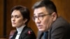 Evgenia Kara-Murza (left), wife of Kremlin critic Vladimir Kara-Murza looks on next to Sergei Davidis, head of the political prisoners support program at the Memorial human rights center, during a press conference in Geneva on March 25, 2024.