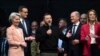 Ukraine's President Volodymyr Zelenskyy (C) talks after being awarded the Charlemagne Prize, in Aachen, Germany, May 14, 2023.