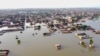 This aerial view shows a flooded residential area after heavy monsoon rains in Balochistan province of Pakistan on Aug. 29, 2022. 