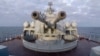 FILE - This handout video grab released by the Russian defense ministry Feb. 12, 2022, shows a gun turret of a Russian ship as it sails in the Black Sea off the Crimean port of Sevastopol. 