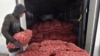 A worker unloads potatoes arriving from Afghanistan at the Termez Cargo Center near Termez, 800 km from Tashkent, Uzbekistan, Oct. 18, 2021. A private trader in India has now exported goods to Uzbekistan for the first time through Pakistan and Taliban-governed Afghanistan.