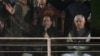 Pakistan's former Prime Minister and opposition leader Imran Khan, center in seated, addresses to his supporters during a rally, in Rawalpindi, Pakistan, Nov. 26, 2022. 