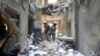 A view shows a damaged building in Kharkiv