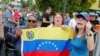 Venezolanos protestan contra el presidente Nicolás Maduro, en Miami, Florida, Estados Unidos, 20 de mayo de 2018, mientras se llevan a cabo las elecciones presidenciales.