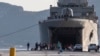Greece Shifts Migrants from Overcrowded Islands to Mainland