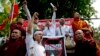 Members of a Buddhist nationalist group shout slogans during a protest outside U.S. Embassy in Yangon, Myanmar against the embassy's April 20, 2016 statement with the word "Rohingya" Thursday, April 28, 2016.