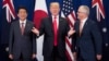Japan's Prime Minister Shinzo Abe, left, U.S. President Donald Trump and Australia Prime Minister Malcolm Turnbull attend a trilateral meeting during the opening ceremony of the 31st Association of South East Asian Nations (ASEAN) Summit in Manila on Nov. 13, 2017.
