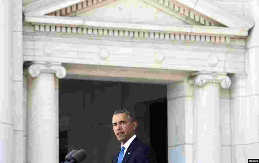 U.S. President Barack Obama speaks during Memorial Day ceremonies at Arlington National Cemetery in Virginia, May 26, 2014. 