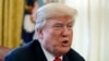 FILE - President Donald Trump speaks with reporters at the White House in Washington, Dec. 22, 2017. Trump will deliver his State of the Union address Jan. 30, 2018.