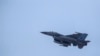 Винищувач F-16 португальської армії бере участь у литовсько-польських військових навчаннях Brave Griffin 24/II поблизу Сувальського коридору біля польського кордону в селі Дірмішкес, Литва. 26 квітня 2024 р. (AP Photo/Mindaugas Kulbis)