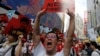 A demonstrator holds up a sign during a protest to demand authorities scrap a proposed extradition bill with China, in Hong Kong, China June 9, 2019.