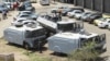 FILE - Zimbabwean riot police with water cannons are seen parked in Harare, Oct. 11, 2018. Lawyers say police in the country have arrested dozens of trade union members ahead of a planned protest in the capital over the worst economic crisis in a decade.