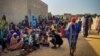 FILE - Sudanese refugees gather as Doctors Without Borders teams assist the war-wounded from West Darfur, Sudan, in Adre hospital, Chad, June 16, 2023. (Doctors Without Borders via REUTERS)