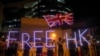 Demonstrators wave a British flag during a rally outside of the British Consulate in Hong Kong, Oct. 23, 2019. 