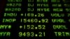 ARCHIVO - Las acciones del sector energético y el enfoque en un nuevo alivio económico en EE.UU. por coronavirus han dado un fuerte empuje a la Bolsa de Nueva York. En la imagen una pizarra con resultados de 2013. 