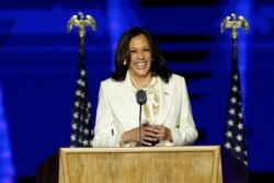 Democratic vice-presidential nominee Kamala Harris smiles as she speaks to supporters at a election rally, after news media announced that Biden has won the 2020 U.S. presidential election, Nov. 7, 2020.