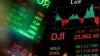 Los movimientos en la bolsa de Nueva York han visto ligeros cambios esta semana desde que varios estados en EE.UU. han anunciado la salida de sus periodos de confinamiento. En la imagen una captura de pantalla del promedio industrial Dow Jones.