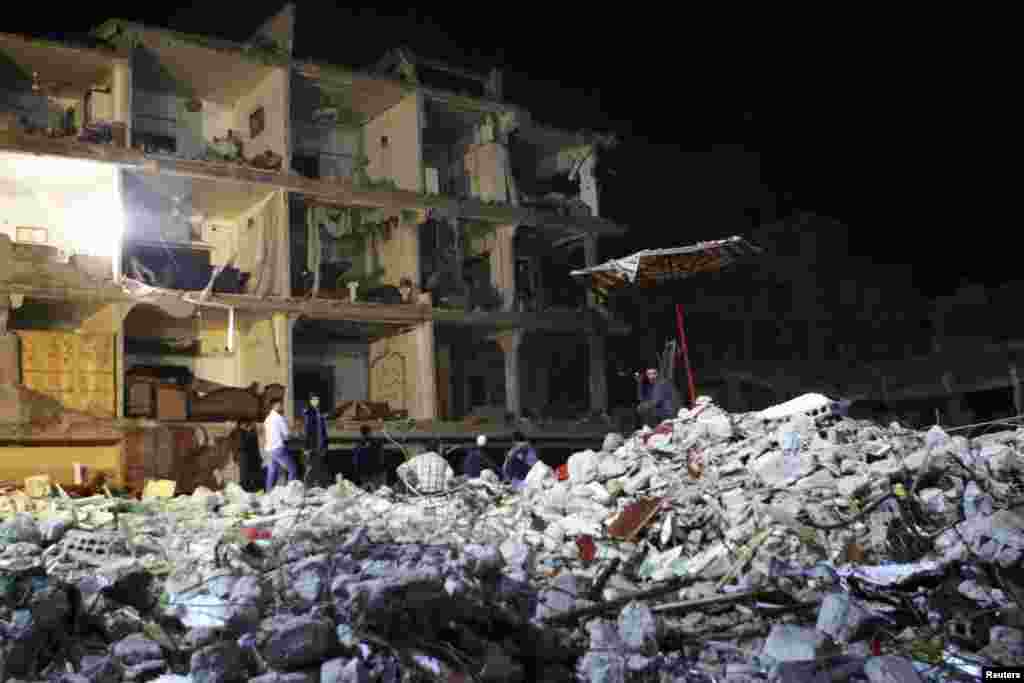 A building that anti-government sources said was destroyed by Syrian President Bashar al-Assad's forces is seen in Saqba, Damascus, Syria, October 22, 2012. 