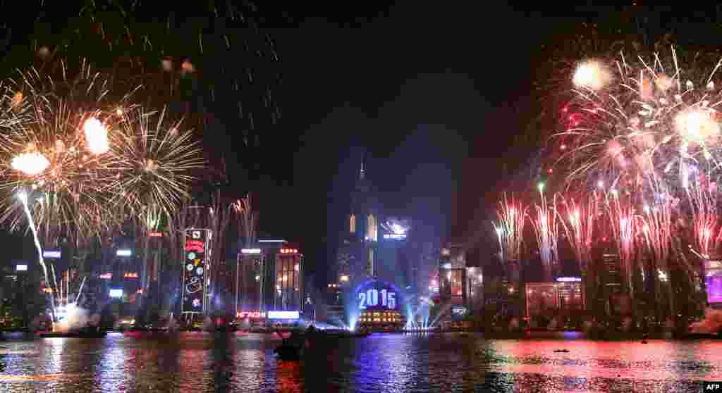 Fireworks explode over Victoria Harbour in Hong Kong. Just like previous years, the city&#39;s iconic skyline along Victoria Harbour will light up with an eight-minute pyrotechnic display, as tens of thousdands of partygoers will flock to the waterfront to celebrate the New Year.