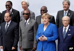 Front from left, the president of Egypt, Abdel Fattah el-Sissi, chairman of the African Union and President of Guinea Alpha Conde, German Chancellor Angela Merkel and the President of Tunisia during the conference 'G20 Africa Partnership – Investing in a Common Future' in Berlin, June 12, 2017.
