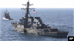 U.S. Navy destroyer USS Cole as it is towed from the port city of Aden, Yemen, on Oct. 29, 2000 (file photo).