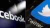 FILE - This combination of photos shows logos for social media platforms Facebook and Twitter. 