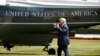 FILE - President Donald Trump reacts as he walks on the South Lawn of the White House in Washington to board the Marine One helicopter to Andrews Air Force Base, Maryland, Aug. 4, 2017. The White House says the president will travel in November to Japan, South Korea, China, Vietnam and the Philippines.