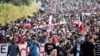 Migranti u karavanu prema američkoj granici u Tapačuli, državi Čiapas, Meksiko, 24. decembra 2023. godine. (Foto: AFP)