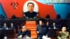 북한 김일성 주석(왼쪽)과 김정일 국방위원장(왼쪽 두번째)이 지난 1980년 10월 평양에서 열린 제6차 노동당 대회에 참가한 모습을 지난 2011년 12월 조선중앙통신이 보도했다. (자료사진)