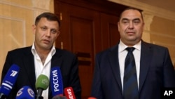 Александр Захарченко и Игорь Плотницкий 