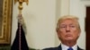 President Donald Trump listens in the Roosevelt Room of the White House in Washington, Aug. 2, 2017, during an event to unveil legislation that would place new limits on legal immigration. 