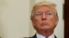 President Donald Trump listens in the Roosevelt Room of the White House in Washington, Aug. 2, 2017, during an event to unveil legislation that would place new limits on legal immigration. 
